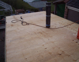 felt roofing stripped back to boards